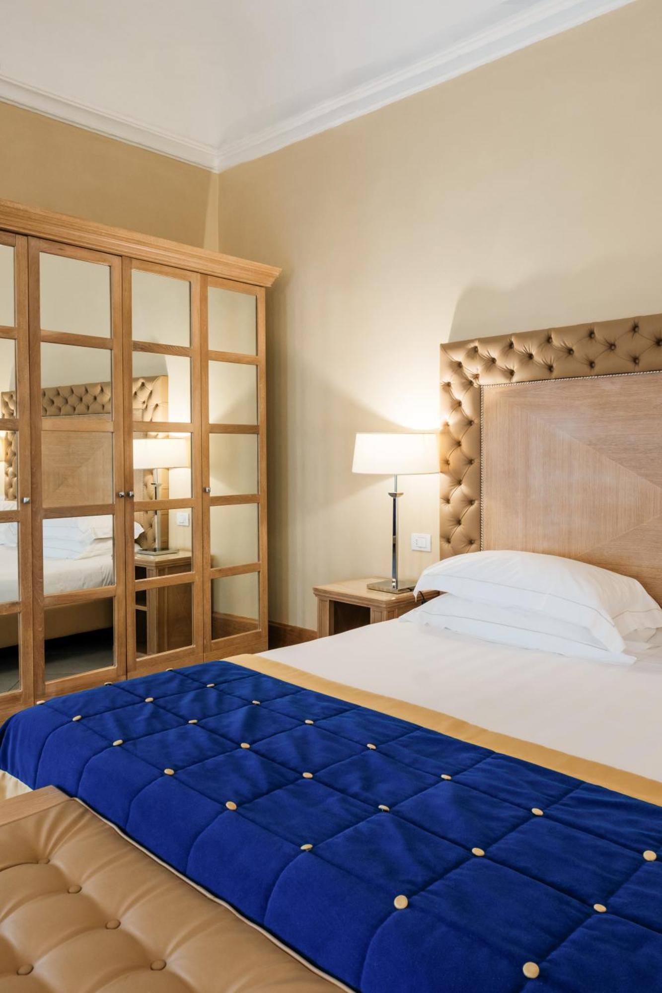 빌라 톨로메이 호텔&리조트 피렌체 외부 사진 A bedroom at the hotel