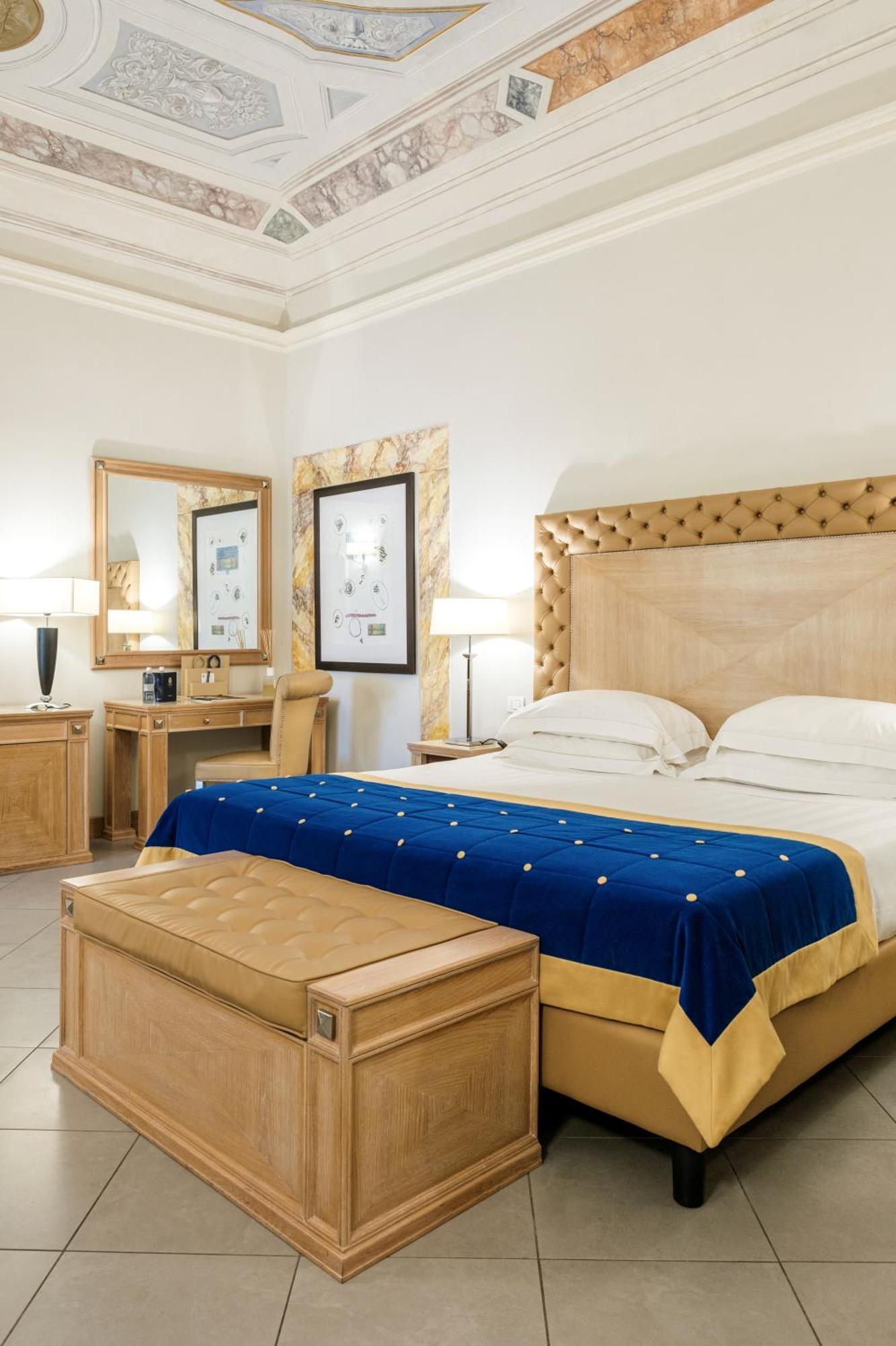 빌라 톨로메이 호텔&리조트 피렌체 외부 사진 A bedroom at the hotel