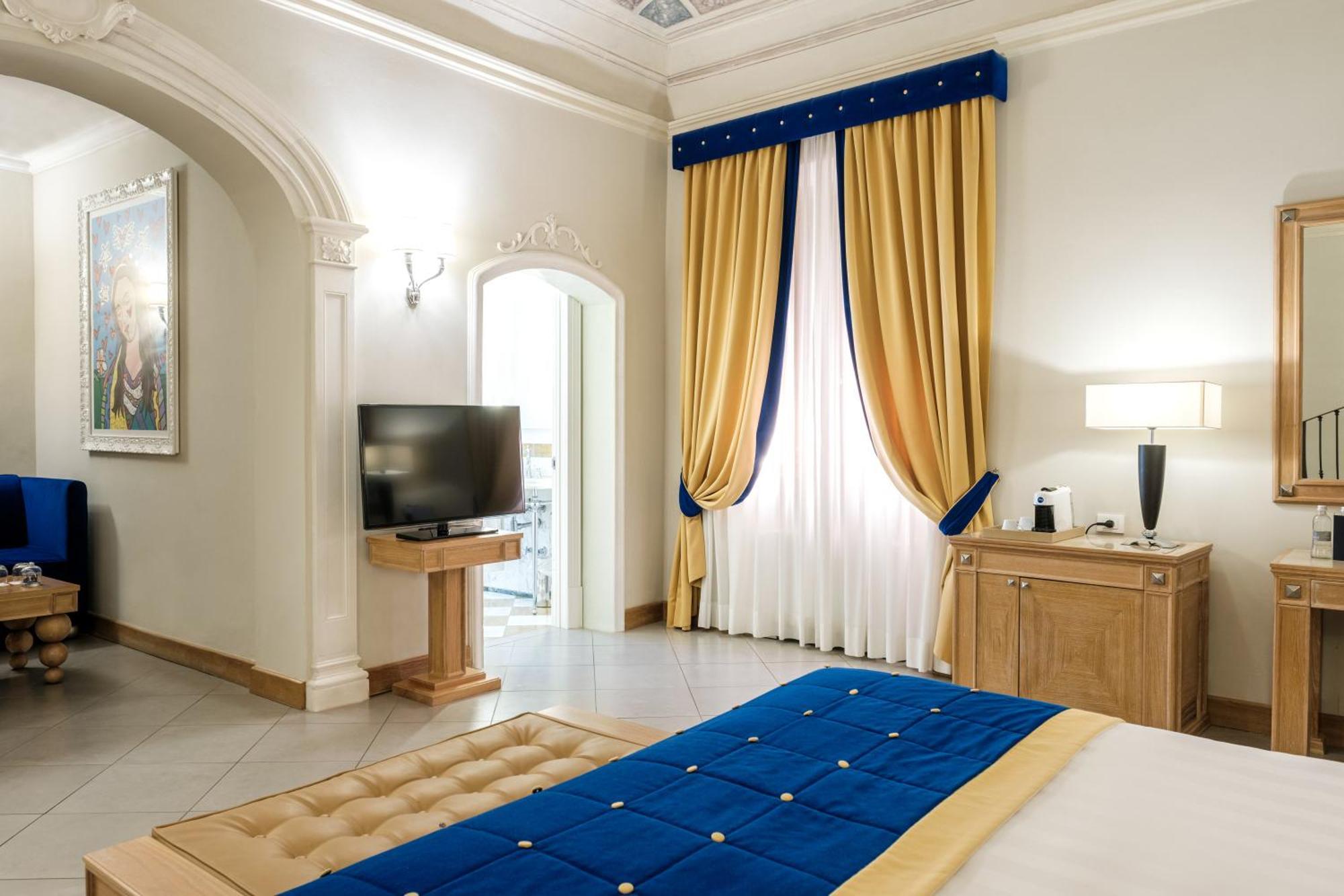 빌라 톨로메이 호텔&리조트 피렌체 외부 사진 A bedroom at the hotel